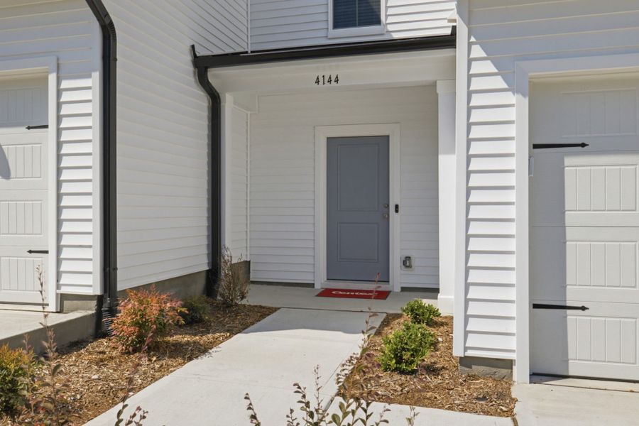 Exterior details and patio area of a home in Carpenter Falls, Durham (Image 3).