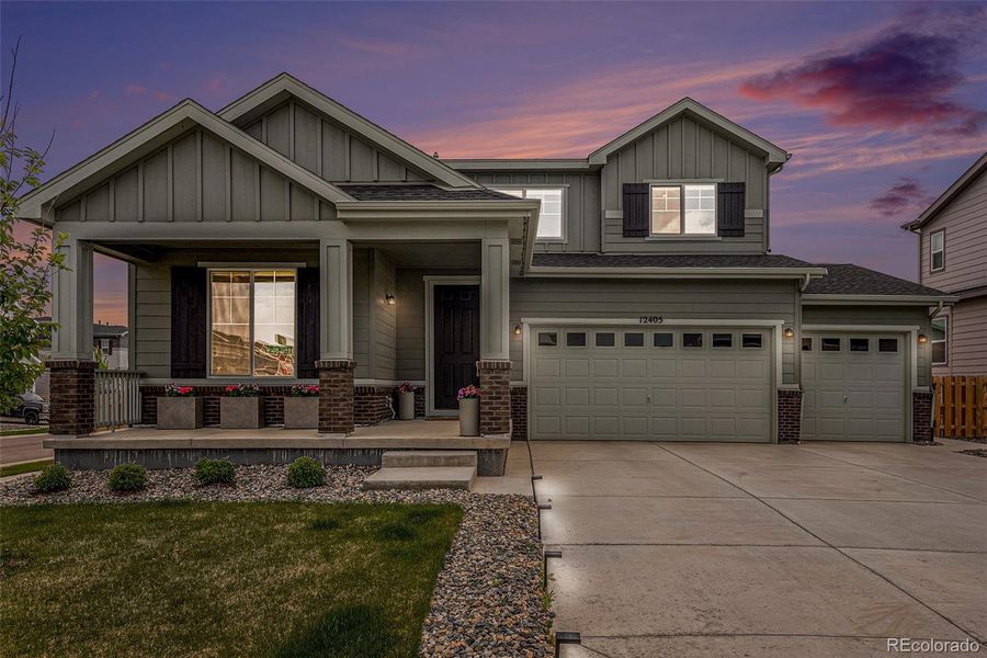 Front exterior of a new home in , Commerce City, CO, highlighting curb appeal (Image 22).
