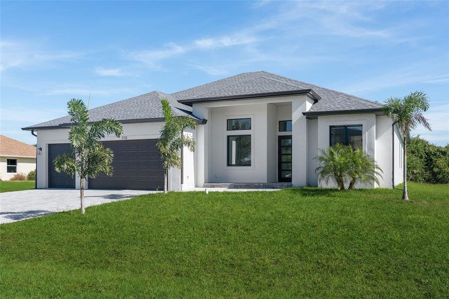 Front exterior of a new home in , Rotonda West, FL, highlighting curb appeal (Image 1).