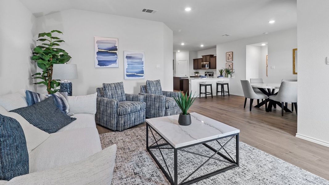 Representative furnished interior of a home built from the X40T Travis by D.R. Horton in Valor Farms, Royse City (Image 10).