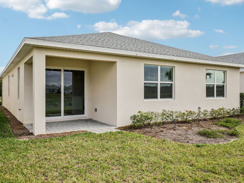 Exterior details and patio area of a home in Crescent Lakes - Reserve Series, Punta Gorda (Image 3).