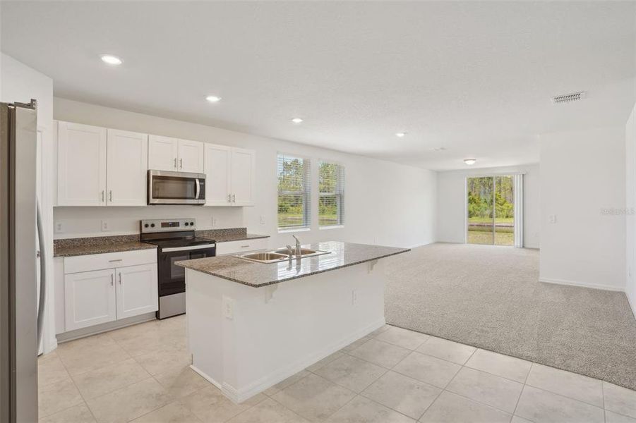 Furnished interior view inside a new home in Lake Deer Estates - Signature Series, Poinciana (Image 9). Furnished interior view inside a new home in Lake Deer Estates - Signature Series, Poinciana (Image 9).