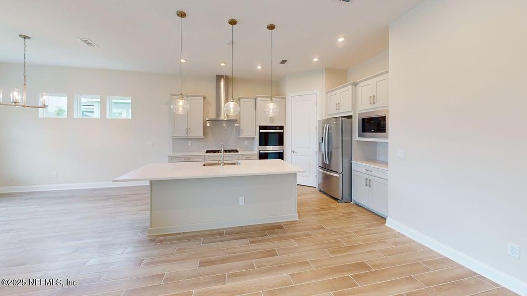 Furnished interior view inside a new home in RiverTown - Ravines, St. Johns (Image 10).