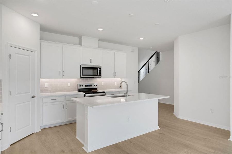 Furnished interior view inside a new home in Seaire, Parrish (Image 17).