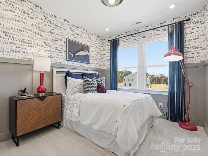 Secondary Bedroom. *Model Photos | Actual Finishes, Structural Selections, and Orientation May Vary.