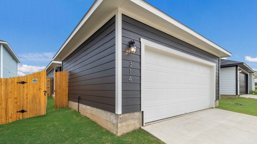 Representative exterior photo of a completed home built from the The Gabriel by D.R. Horton in Valverde, Bastrop, TX (Image 15). Representative exterior photo of a completed home built from the The Gabriel by D.R. Horton in Valverde, Bastrop, TX (Image 15).