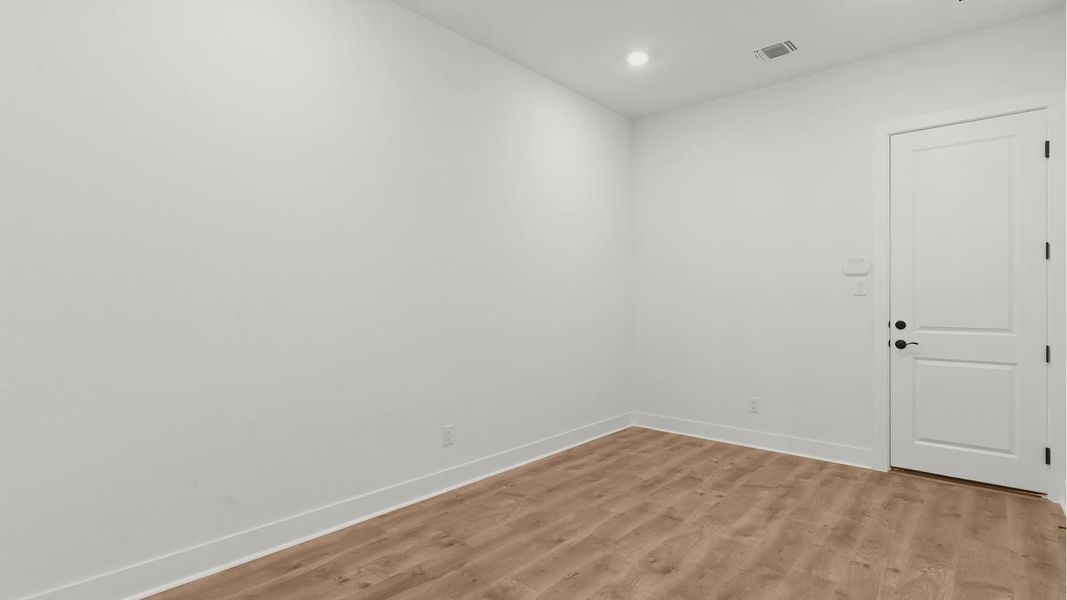 Representative unfurnished interior of a home built from the Drios by Chesmar Homes in Berry Creek Highlands, Georgetown (Image 30).