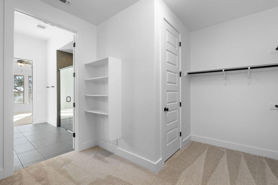 Walk-in closet in Primary Bedroom