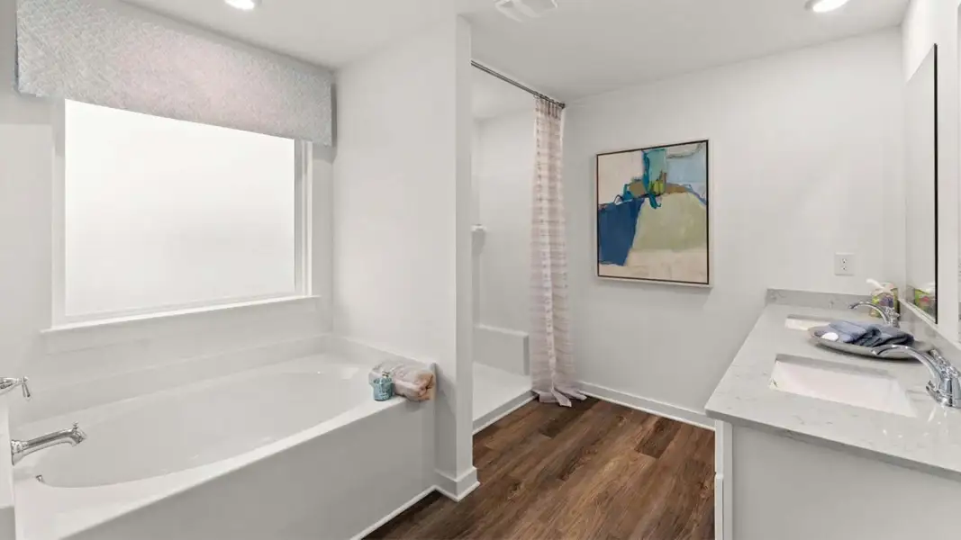 Furnished interior view inside a new home in Magnolia at the Bluffs Phase 3, Freeport (Image 22).