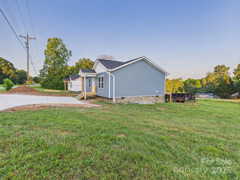 Front exterior of a new home in , Hudson, NC, highlighting curb appeal (Image 2). Front exterior of a new home in , Hudson, NC, highlighting curb appeal (Image 2).