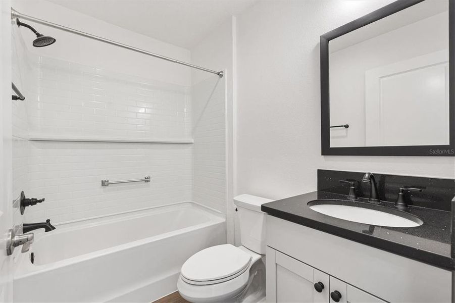 Furnished interior view inside a new home in , The Villages (Image 12).