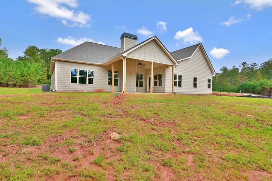 Representative exterior photo of a completed home built from the Candler by Dustin Shaw Homes in Platinum Ridge, Sharpsburg, GA (Image 45). Representative exterior photo of a completed home built from the Candler by Dustin Shaw Homes in Platinum Ridge, Sharpsburg, GA (Image 45).