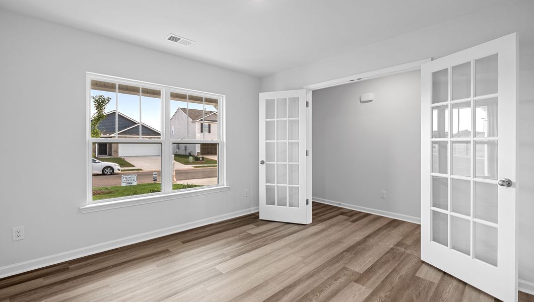 Spacious, unfurnished interior of a new home in Bentley Park, Greenwood (Image 17).