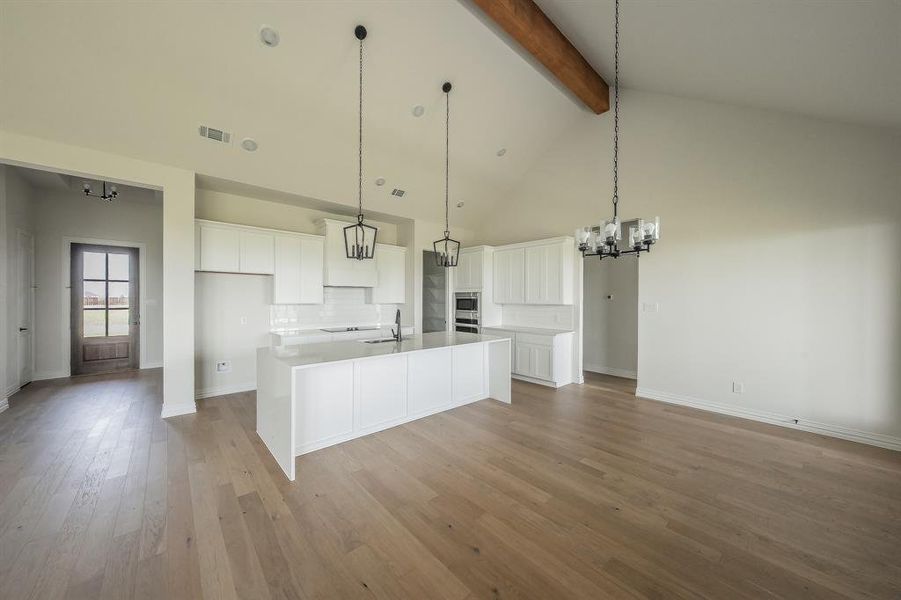 Furnished interior view inside a new home in Matthews Farms, Venus (Image 6).