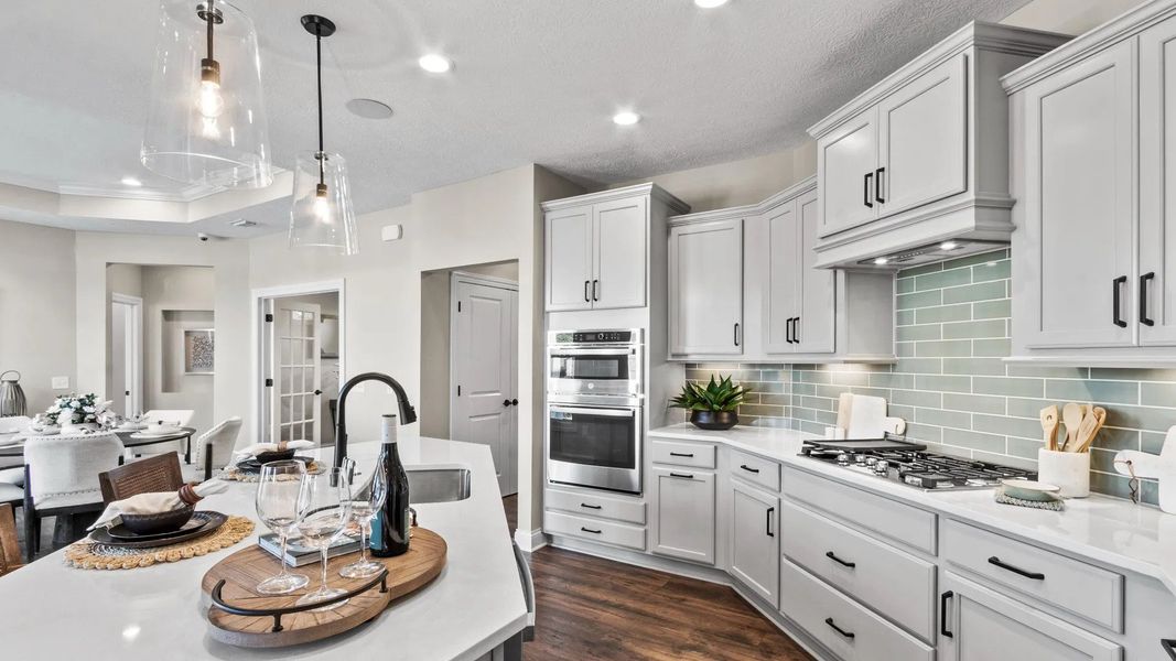 Representative furnished interior of a home built from the Portico by Epcon Communities in The Courtyards by The Manor, Alpharetta (Image 12).