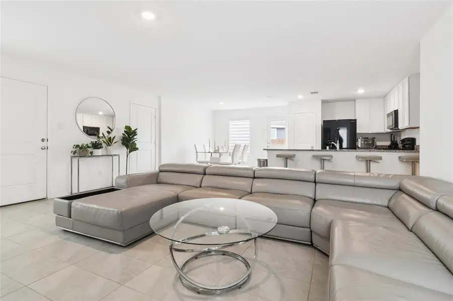 Furnished interior view inside a new home in Tillage Farms, Princeton (Image 5).