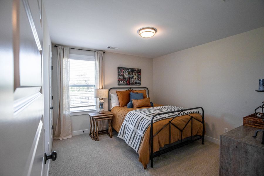 Representative furnished interior of a home built from the Willow by Grant & Co in Manor at Hall Creek, Arlington (Image 92).