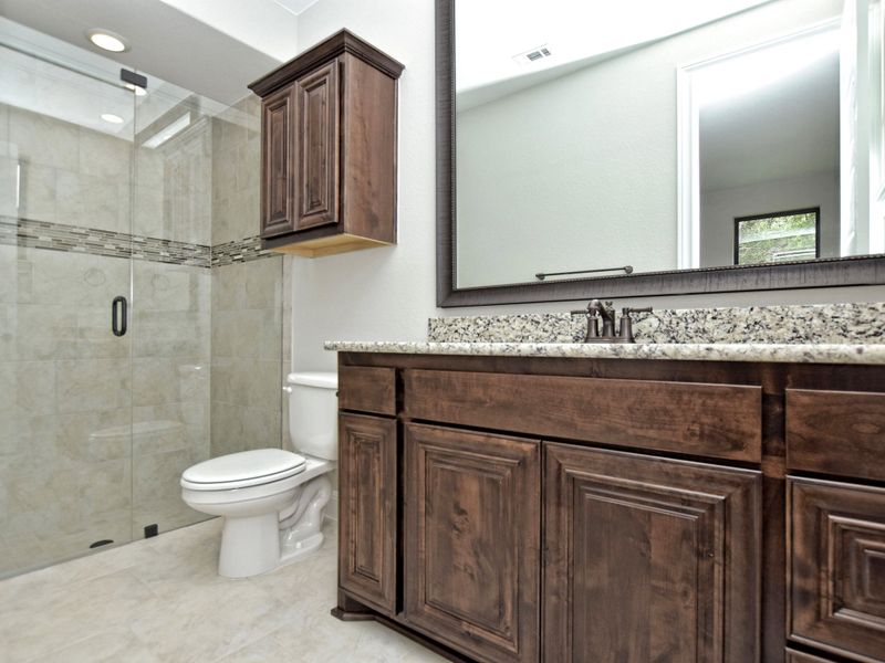 Representative furnished interior of a home built from the Avalon by Giddens Homes in Scofield Farms Estates, Georgetown (Image 120).