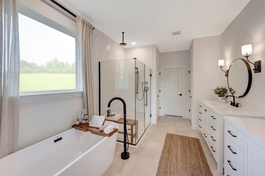 Luxurious primary bath (*Photo not of actual home and used for illustration purposes only.)