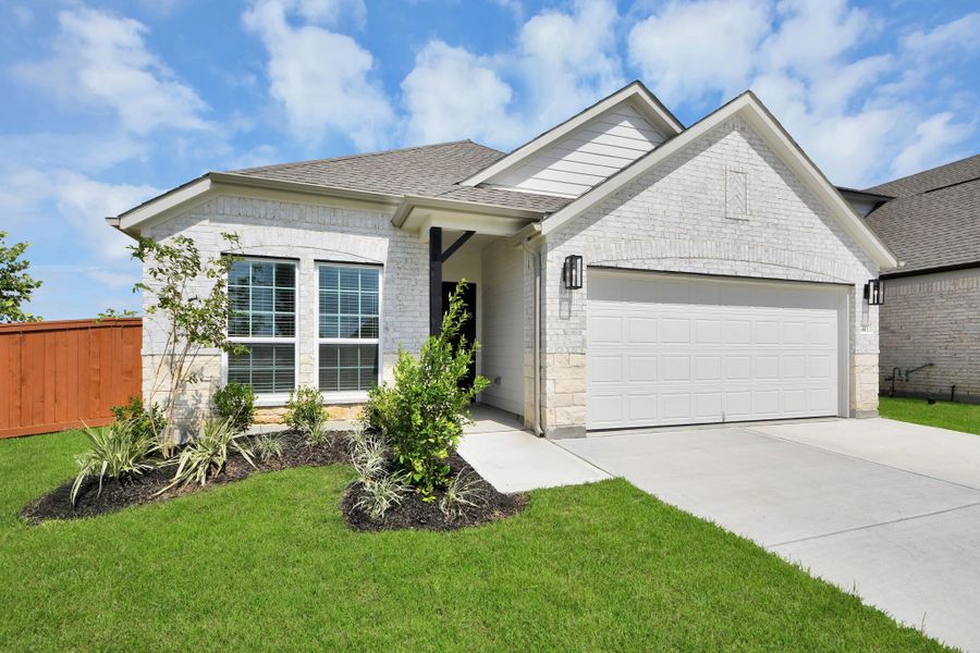 The residence features a practical 2-car garage complemented by a generous driveway, ensuring abundant space for parking needs. The residence features a practical 2-car garage complemented by a generous driveway, ensuring abundant space for parking needs.