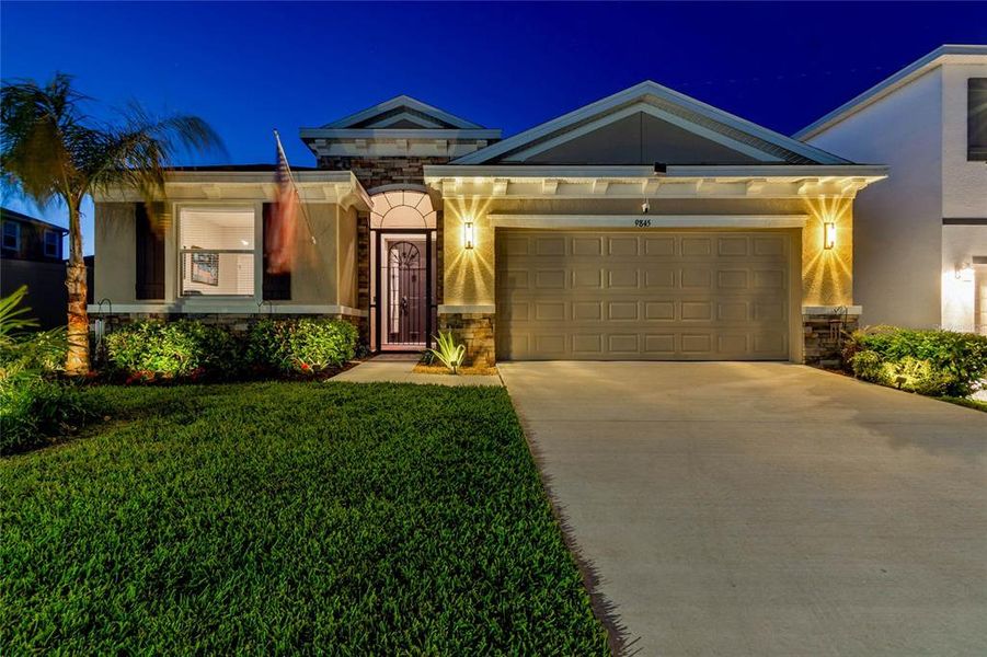 Front exterior of a new home in , Wesley Chapel, FL, highlighting curb appeal (Image 23).