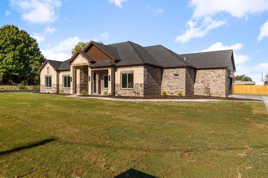 View of front of home with a front yard