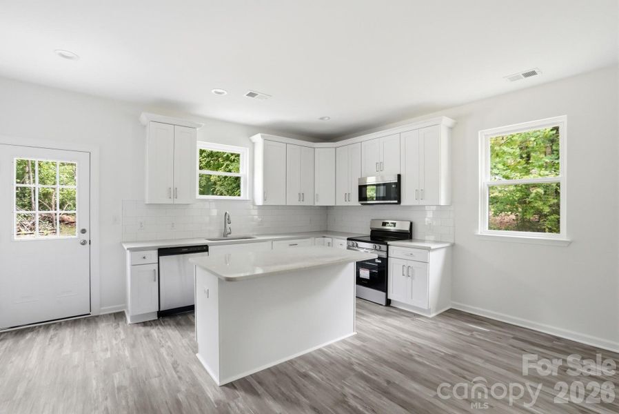 Furnished interior view inside a new home in , Statesville (Image 10).