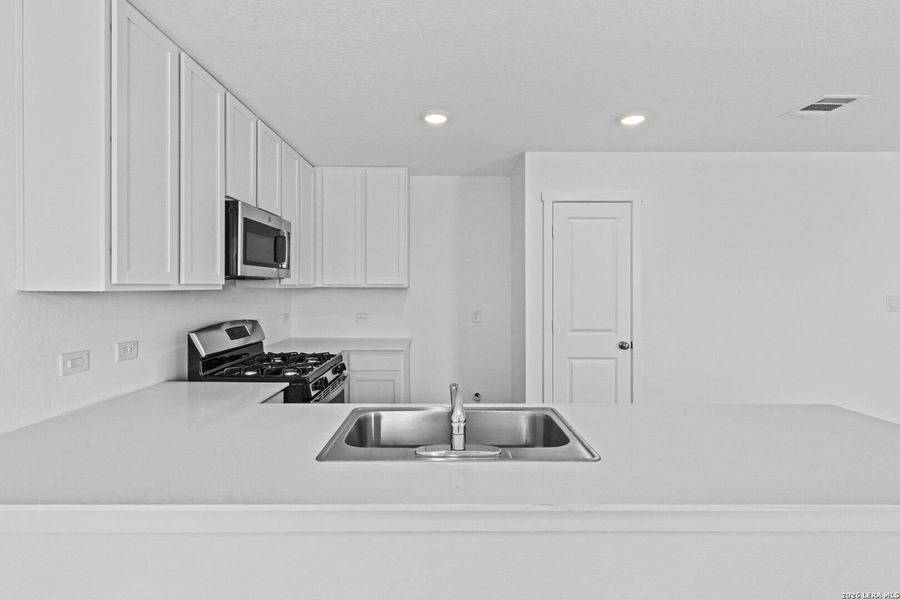 Furnished interior view inside a new home in Spring Grove, St. Hedwig (Image 9).