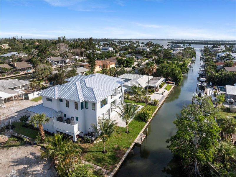 Front exterior of a new home in , Longboat Key, FL, highlighting curb appeal (Image 33). Front exterior of a new home in , Longboat Key, FL, highlighting curb appeal (Image 33).