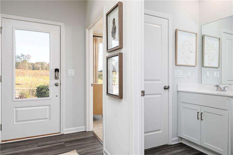 Furnished interior view inside a new home in River Oaks, Locust Grove (Image 7).
