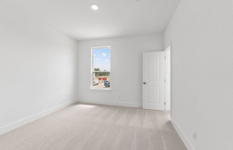 Spacious, unfurnished interior of a new home in Northpoint at Old Settlers, Round Rock (Image 18).