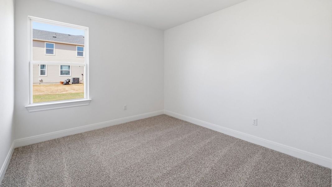 Spacious, unfurnished interior of a new home in Railhead, Cedar Creek (Image 12).