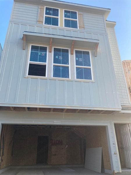 Three-story home with 2 bedrooms, 3.5 baths and 2 car garage Three-story home with 2 bedrooms, 3.5 baths and 2 car garage