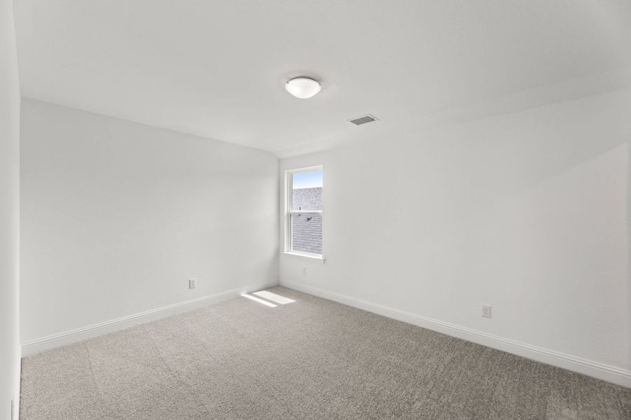 Representative unfurnished interior of a home built from the The Tucker by UnionMain Homes in Reunion, Rhome (Image 21).