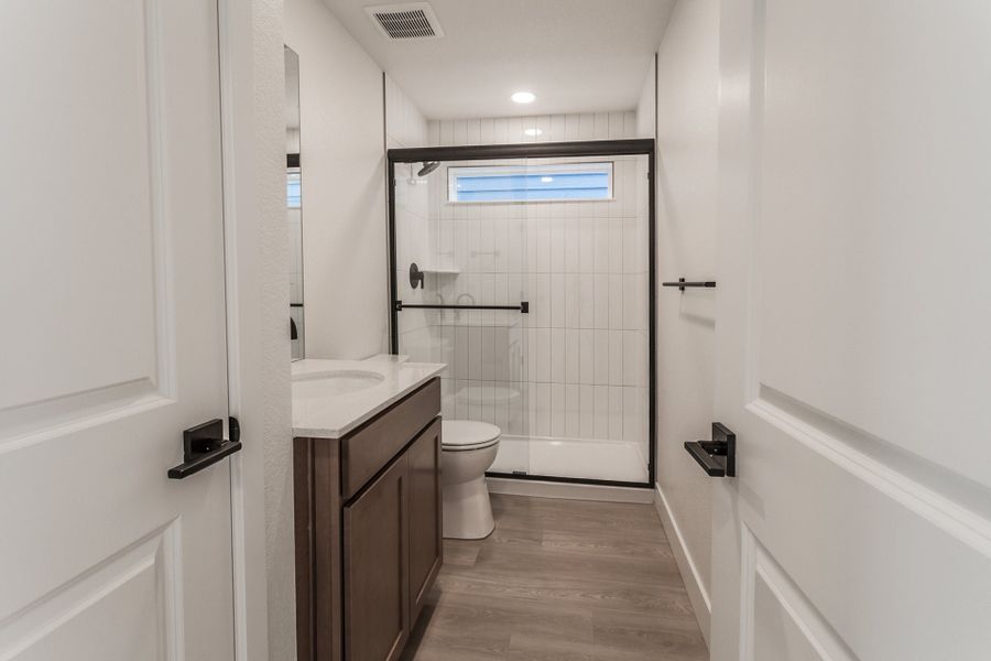 Furnished interior in a model home at Prairie Song Cottages in Windsor (Image 18). Furnished interior in a model home at Prairie Song Cottages in Windsor (Image 18).