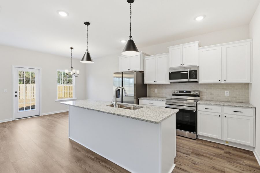 Representative furnished interior of a home built from the The Porter by RTS Homes in The Pointe at Villages on Marne, Hinesville (Image 7).