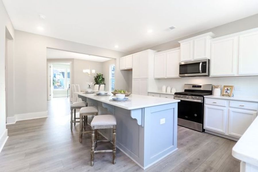 Representative furnished interior of a home built from the Inverness P by True Homes in Homecoming, Ravenel (Image 6).