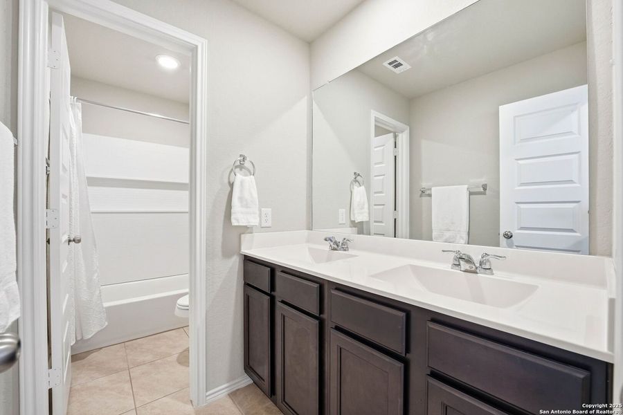 Furnished interior view inside a new home in Abbott Place, St. Hedwig (Image 36).