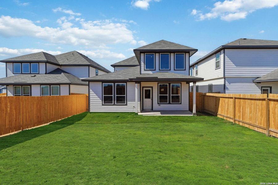 Exterior details and patio area of a home in Red Hawk Landing, San Antonio (Image 3).