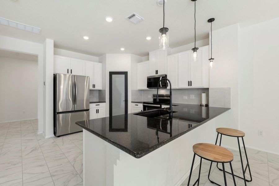 Furnished interior view inside a new home in Sonterra - Cool Water, Jarrell (Image 7).