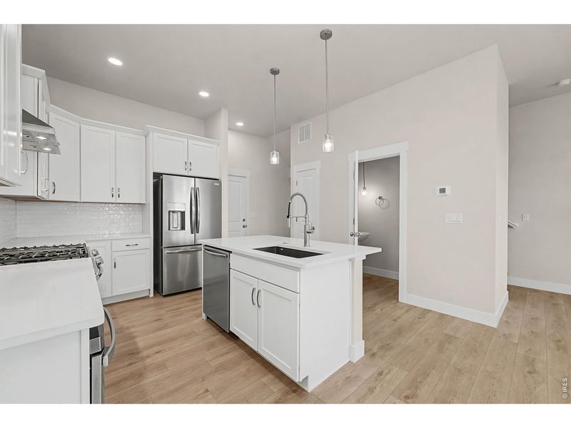 Furnished interior view inside a new home in The Lakes at Centerra - The Shores, Loveland (Image 7).