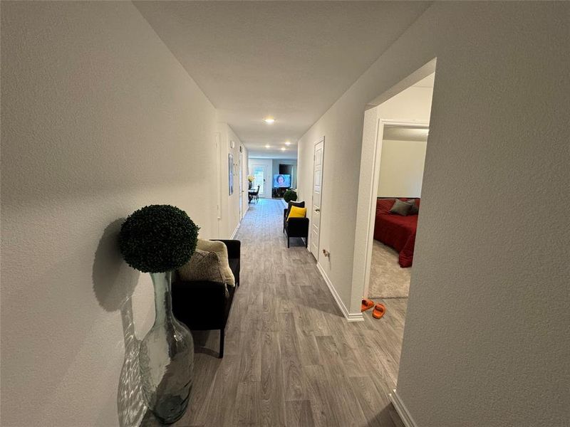 Corridor featuring hardwood / wood-style floors