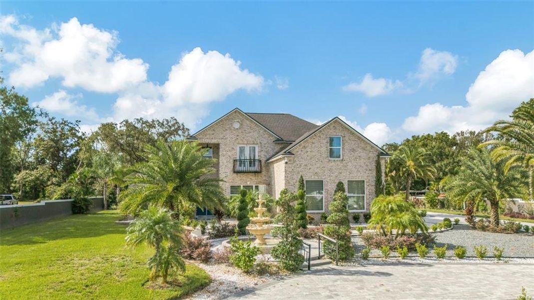 Front exterior of a new home in , Lakeland, FL, highlighting curb appeal (Image 25). Front exterior of a new home in , Lakeland, FL, highlighting curb appeal (Image 25).