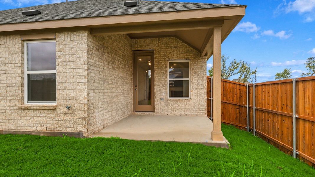 Exterior details and patio area of a home in Thompson Farms, Van Alstyne (Image 28). Exterior details and patio area of a home in Thompson Farms, Van Alstyne (Image 28).