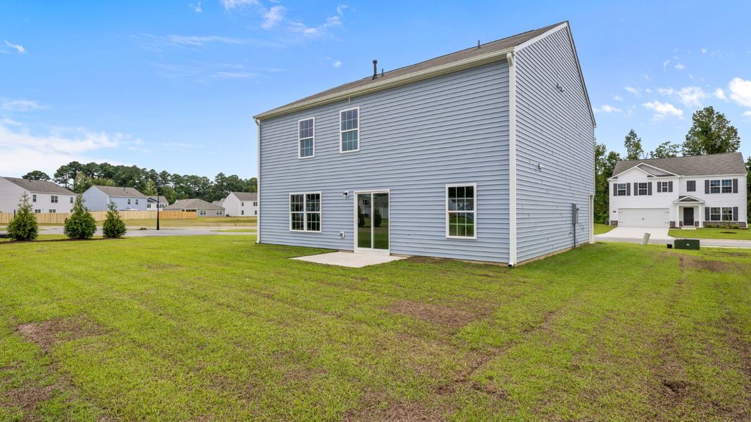 Front exterior of a new home in Madeline Farm, New Bern, NC, highlighting curb appeal (Image 15).