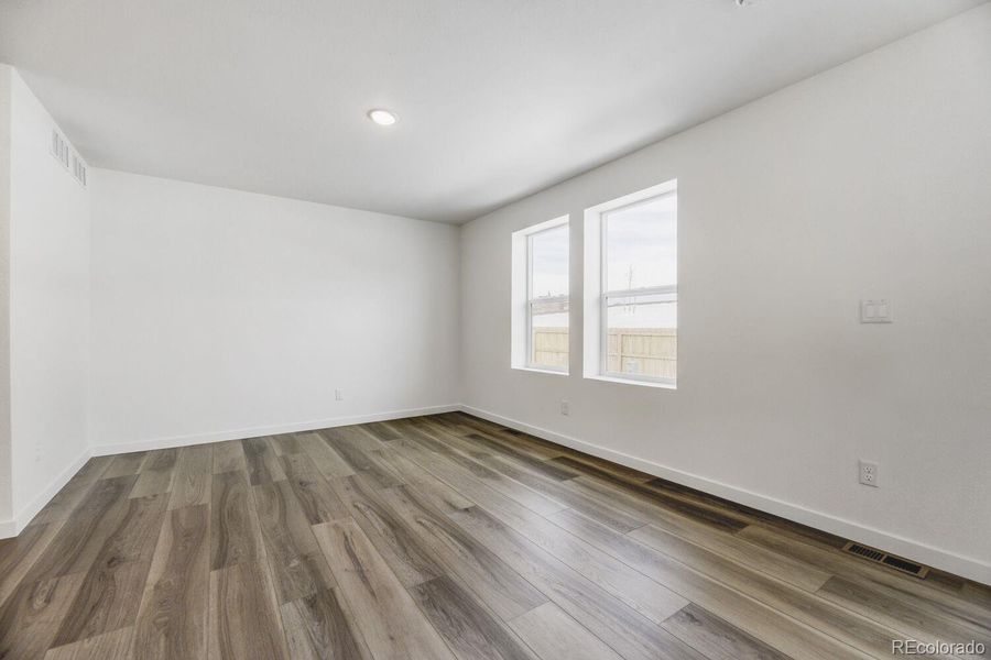 Spacious, unfurnished interior of a new home in Copper Chase: The Celestial Collection, Colorado Springs (Image 8).