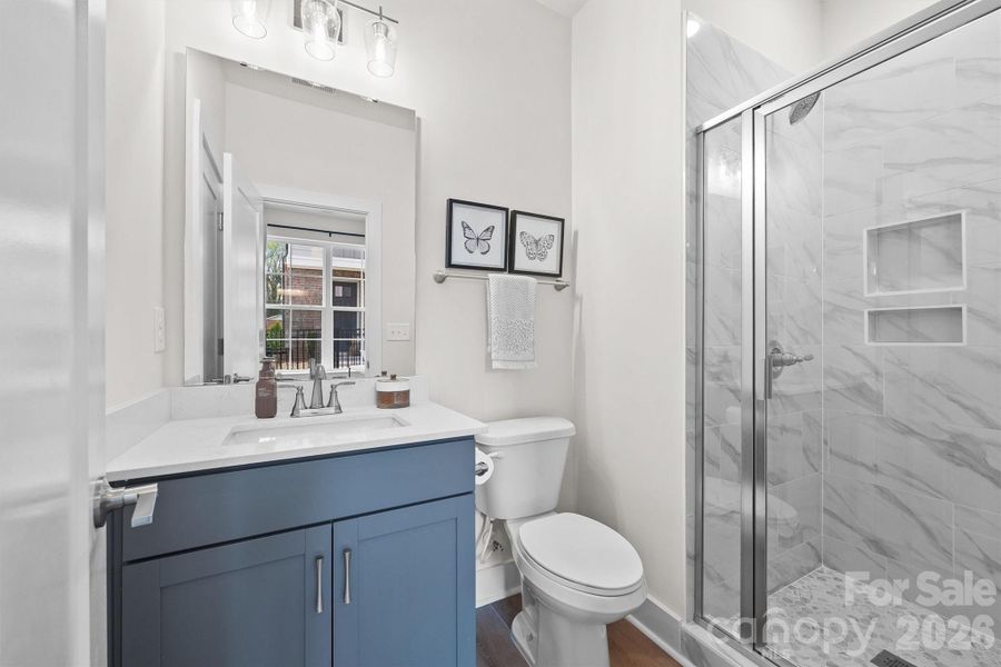 Entry level full bathroom