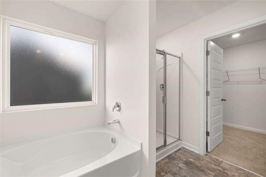 Furnished interior view inside a new home in Oakchase at Hampton, Hampton (Image 12).