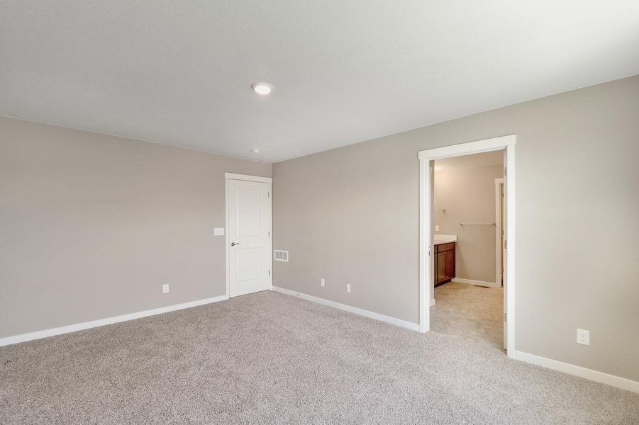 Representative unfurnished interior of a home built from the Holcombe by D.R. Horton in Brighton Crossing, Brighton (Image 22).