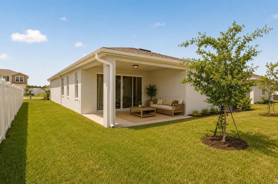 Exterior details and patio area of a home in Seasons at Lakeside Forest, Tavares (Image 4).
